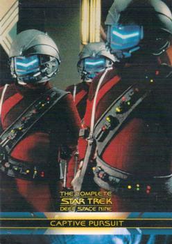 2003 Rittenhouse The Complete Star Trek Deep Space Nine #10 A reptilian humanoid named Tosk reluctantly ag Front