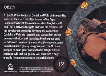 2007 Rittenhouse Stargate SG-1 Season 9 #12 At the SGC, the bodies of Daniel and Vala go i Back