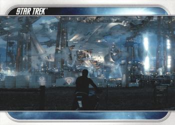 2009 Rittenhouse Star Trek Movie Cards #18 Kirk mulls the opportunity to follow in his fa Front