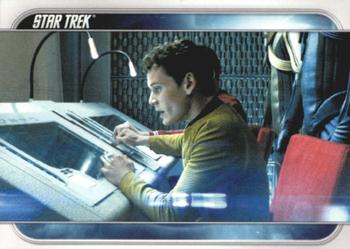 2009 Rittenhouse Star Trek Movie Cards #56 Chekov feverishly works to lock onto Kirk and Front