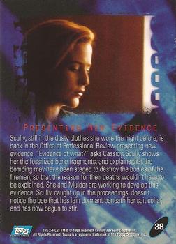1998 Topps The X-Files: Fight the Future #38 Presenting New Evidence Back