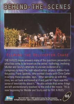 1998 Topps The X-Files: Fight the Future #65 Filming the Helicopter Chase Back