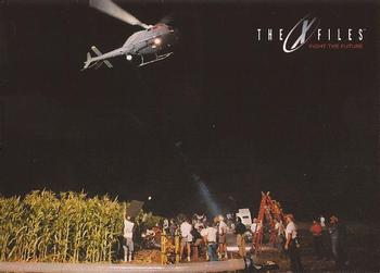 1998 Topps The X-Files: Fight the Future #65 Filming the Helicopter Chase Front