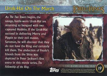 2002 Topps Lord of the Rings: The Two Towers #19 Uruk-Hai On The March Back