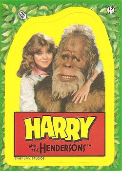 1987 Topps Harry and the Hendersons - Stickers #12 (Harry hugging Sarah Henderson) Front