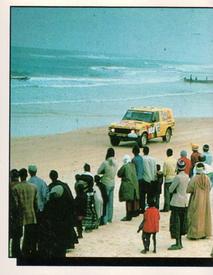 1987 Panini Motor Adventures Stickers #52 Rally Trucks on beach (left) Front