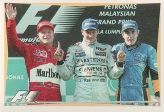 2003 Edizione Figurine Formula 1 #240 Kimi Raikkonen / Rubens Barrichello / Fernando Alonso Front