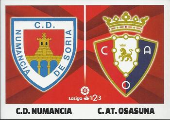 2017-18 Panini LaLiga Santander Este Stickers - LaLiga 1/2/3 #7 Escudos Numancia / Osasuna Front