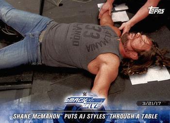 2018 Topps WWE Road To Wrestlemania #76 Shane McMahon Puts AJ Styles Through a Table - SmackDown LIVE Front