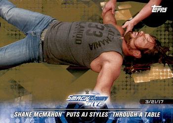 2018 Topps WWE Road To Wrestlemania - Bronze #76 Shane McMahon Puts AJ Styles Through a Table - SmackDown LIVE - 3/21/17 Front
