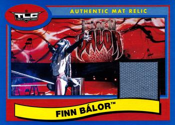 2018 Topps WWE Heritage - TLC: Tables, Ladders & Chairs 2017 Mat Relics Blue #TLC-FB Finn Bálor Front