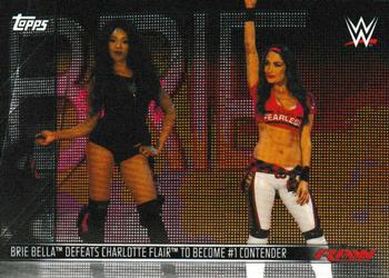 2019 Topps WWE RAW - Women's Revolution (Part 2) #DR-19 Brie Bella Defeats Charlotte Flair To Become #1 Contender Front