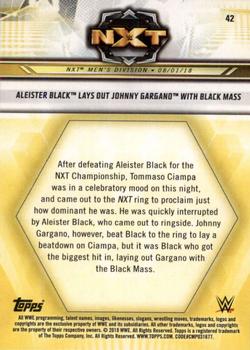 2019 Topps WWE NXT #42 Aleister Black Lays Out Johnny Gargano with Black Mass Back