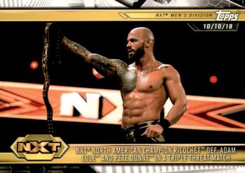 2019 Topps WWE NXT #55 NXT North American Champion Ricochet def. Adam Cole and Pete Dunne in a Triple Threat Match Front