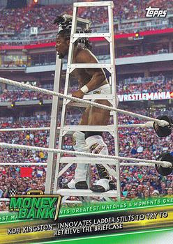 2019 Topps WWE Money in the Bank - Greatest Matches & Moments #GMM-4 Kofi Kingston Innovates Ladder Stilts to Try to Retrieve the Briefcase Front