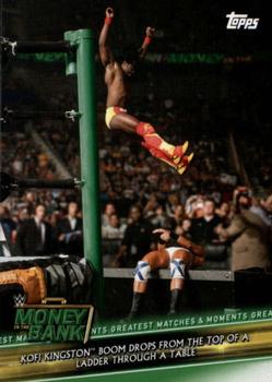 2019 Topps WWE Money in the Bank - Greatest Matches & Moments #GMM-5 Kofi Kingston Boom Drops from the Top of a Ladder Through a Table Front