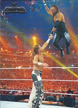 2011 Topps WWE Champions #1 Undertaker Defeats Shawn Michaels Front