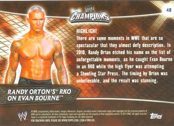 2011 Topps WWE Champions #48 Randy Orton's RKO on Evan Bourne Back