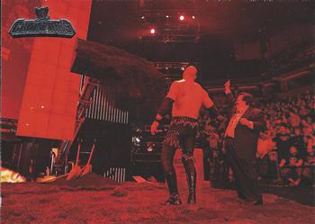 2011 Topps WWE Champions #52 Kane Buries Undertaker Front