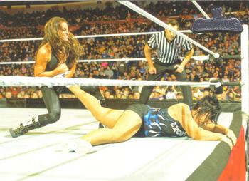 2011 Topps WWE Champions #66 Trish Stratus Fights Vickie Guerrero Front