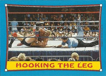 1987 Topps WWF #48 Hooking the Leg Front