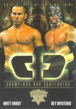 2004 Fleer WWE WrestleMania XX - Champions And Contenders Memorabilia #CCS-MH Matt Hardy / Rey Mysterio Front