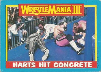 1987 O-Pee-Chee WWF #57 Harts Hit Concrete Front