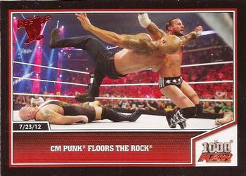 2013 Topps Best of WWE #35 CM Punk Floors The Rock Front